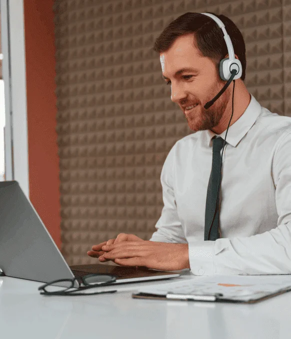 A captioner works meticulously to provide highly accurate closed captioning services in Albuquerque for synchronization.