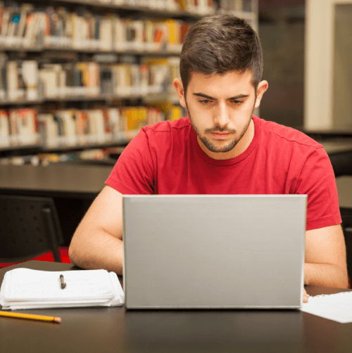 The student using Student Typing services converting handwritten notes into accurate academic text with accuracy.