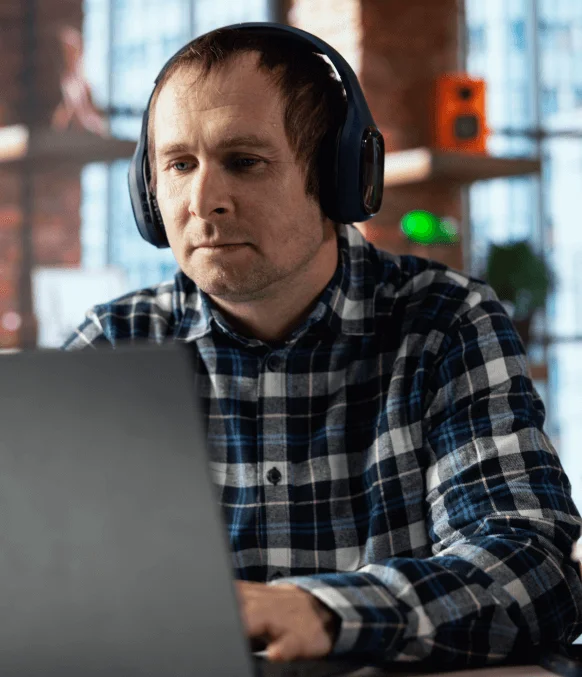 Customer using affordable Closed Captioning in Pittsburgh, with legible captions for video accessibility in less time.