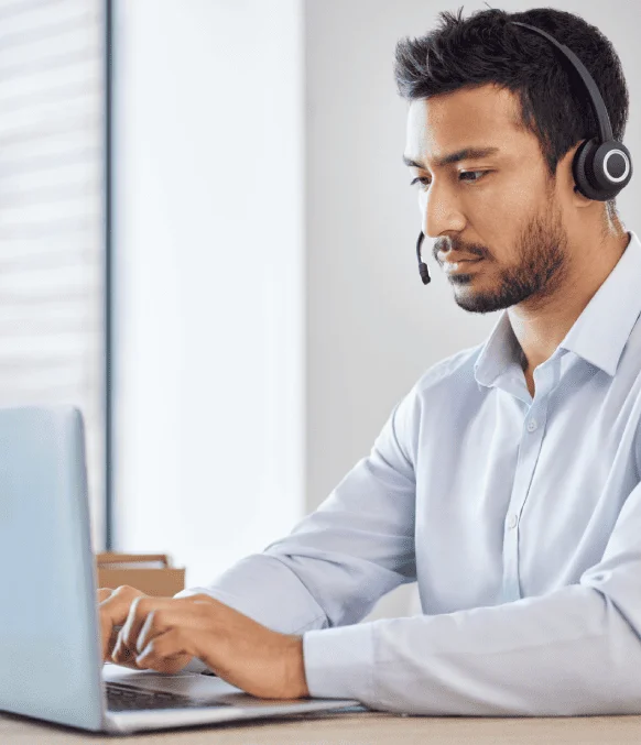 A transcriptionist converting audio and video recordings into text, helping New Hampshire media companies with accuracy.