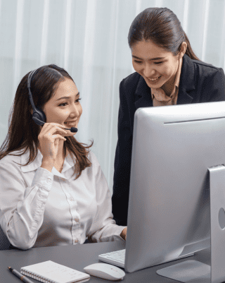 A professional transcribers delivering accurate Burmese transcription services to a satisfied business client.