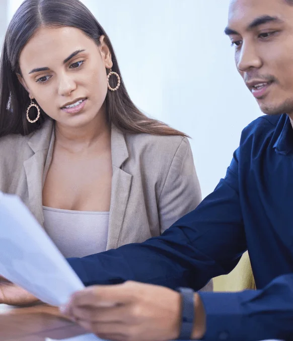 A translator applies Express Translation Services to a business contract, keeping clauses, headings, and layout intact.