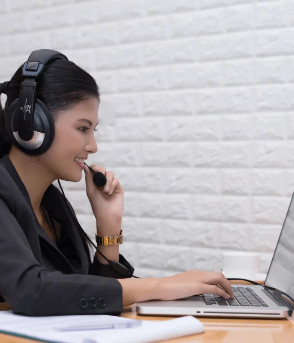 Transcriptionist working on audio files related to Indianapolis' rich history and its unique local charm.