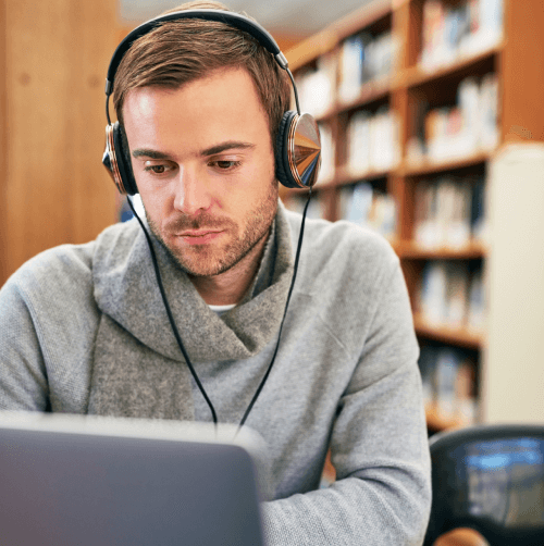 Student benefiting readable captions on educational videos, increasing accessibility for online learning in Portland.