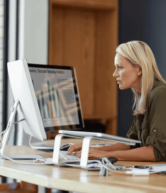 Business professional easily accessing converted PDF to Word documents on computer for enhanced editing workflow. Business professional easily accessing converted PDF to Word documents on computer for enhanced editing workflow.