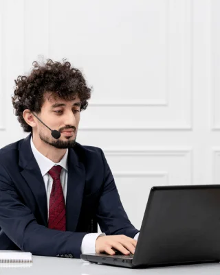 Expert transcriber working on audio files using safe and reliable Transcription in Olathe for accurate text output.