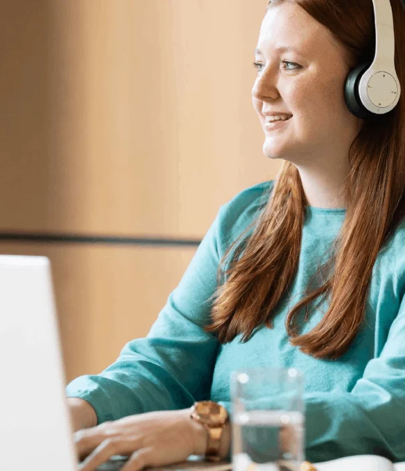 A project manager uploads MP3, MP4, and WAV files as Irish Transcription Services deliver one multi-format transcript.