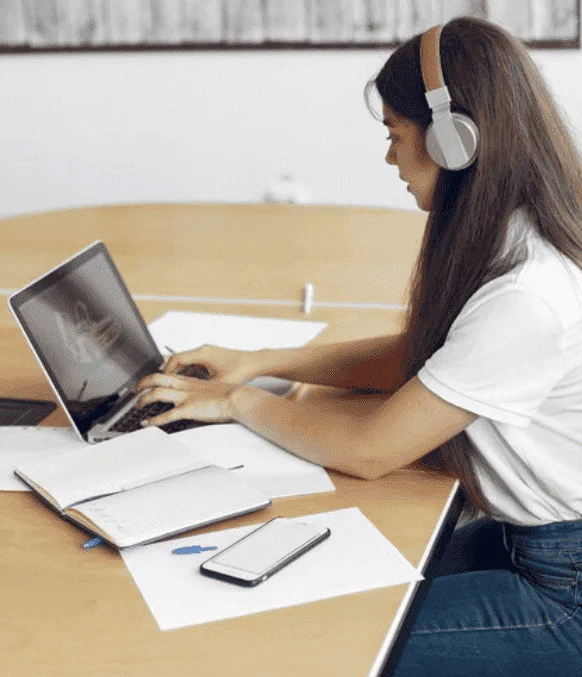 Student using online academic captioning services to enhance accessibility and comprehension of educational content. Student using online academic captioning services to enhance accessibility and comprehension of educational content.
