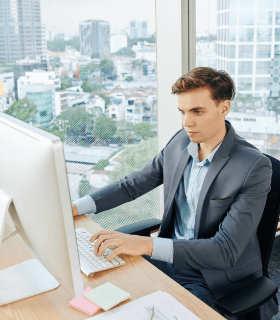 A professional translator working on multiple files using Online Translation services across industries.