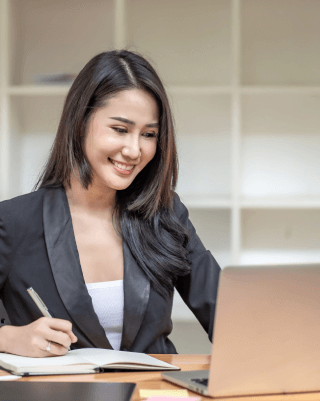 An expert translator working on translating documents in Cavite City with Translation Services Cavite City.