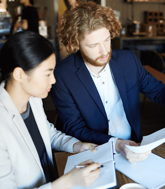 Translators delivering overnight translation services, quickly preparing urgent business documents for timely client meetings. Translators delivering overnight translation services, quickly preparing urgent business documents for timely client meetings.