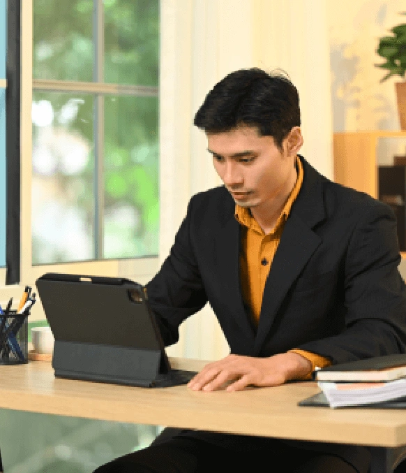 Focused translator working on the laptop, representing reliable for assurance translation agency services trusted worldwide. Focused translator working on the laptop, representing reliable for assurance translation agency services trusted worldwide.