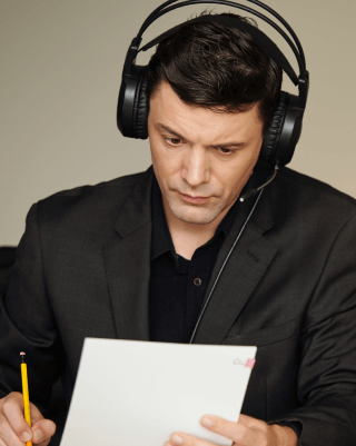 Transcriptionist using sermon transcription services to help churches reach broader audiences online and offline efficiently.