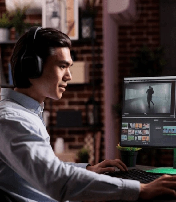 Translator working a audiovisual with multimedia software, representing expert audiovisual translation services. Translator working a audiovisual with multimedia software, representing expert audiovisual translation services.