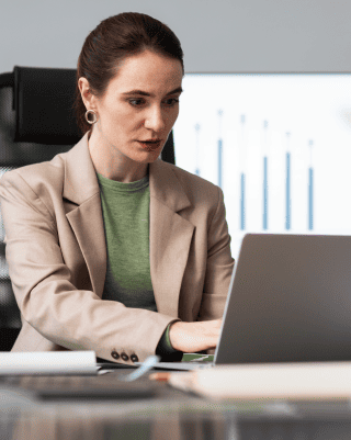 A professional translator using tools to offer translation services in Ramstein Miesenbach with high accuracy.