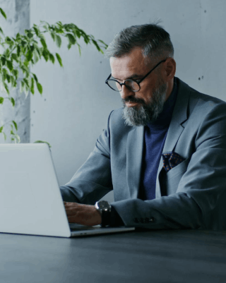 A translator checks files in a locked portal as Instant Translation Services keep secure delivery and privacy for clients.
