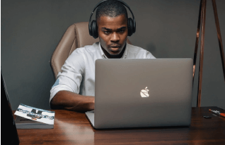 Transcriptionists listen to audio file for transcription