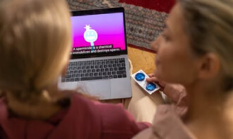 A Laptop Playing a Sex Education Video Presentation