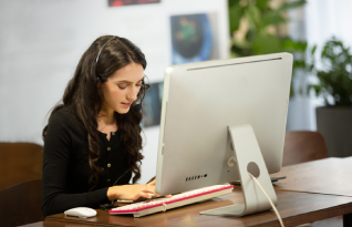 A business leader using reliable transcription services in Oxnard for professional content delivery in editable formats.