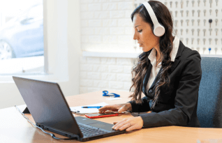 Expert working working remotely, delivering comprehensive San Francisco transcription services for various industries.
