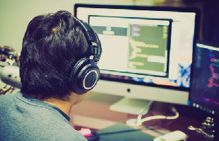   Trained transcriber listening to videos for accurate transcription in Olathe. 