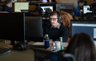 A professional transcriber working on a transcription project