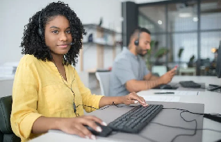 Professional transcribers working on different language translations