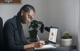 A certified transcriber working on a video transcription.