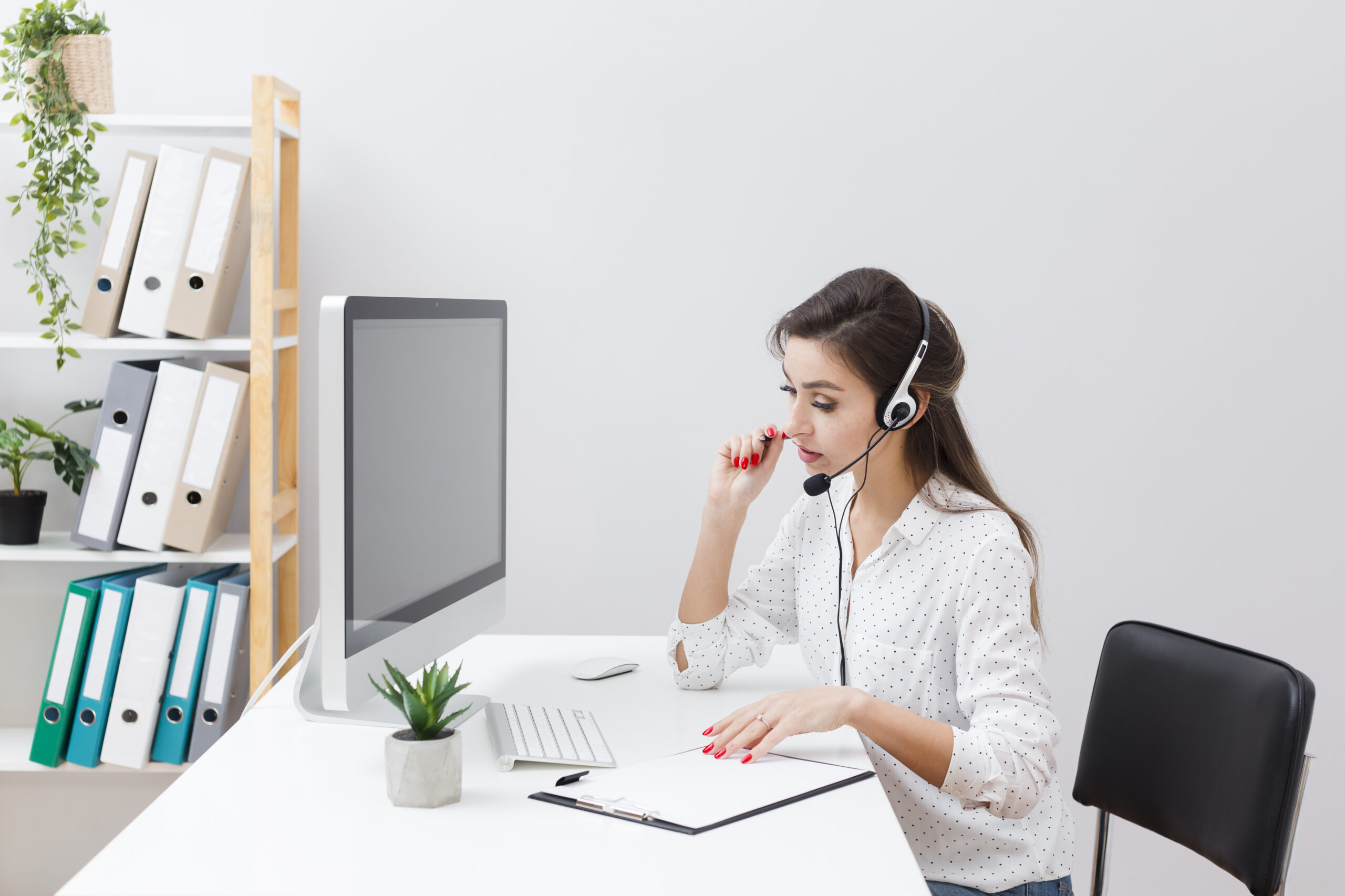 A professional transcriber working on an audio file to transcribe at a cheap rate